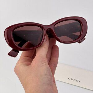 Gucci GG1829SK 003 Women’s Sunglasses – Burgundy Oval Frame with Red Lenses